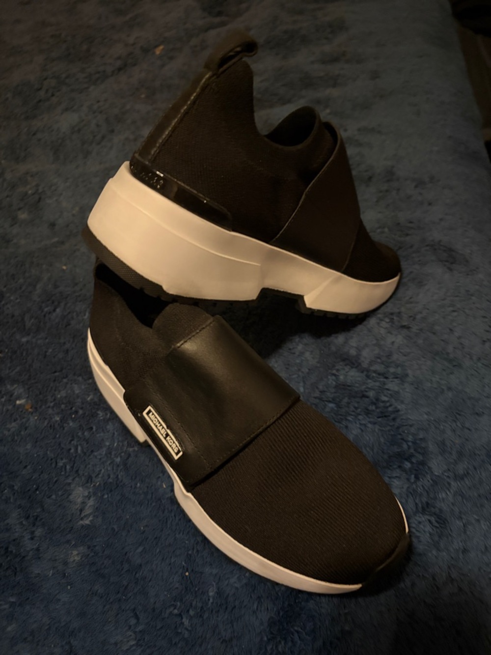 Michael Kors Black and White Slip-On Athletic Sneakers